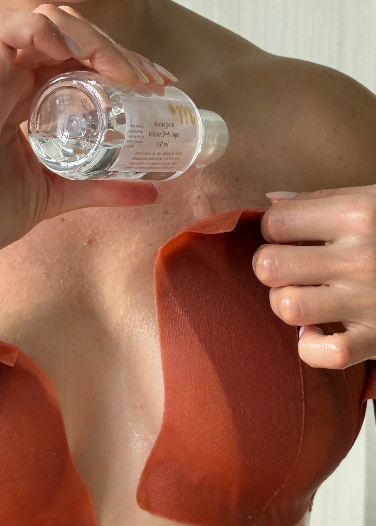 Aceite para retirar boob tape